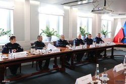 Polish Police sitting at the conference table