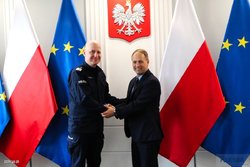 Polish Police and FBI Executives shaking hands