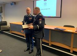 1)	Chiefs of Polish and Latvian Police exchange gifts